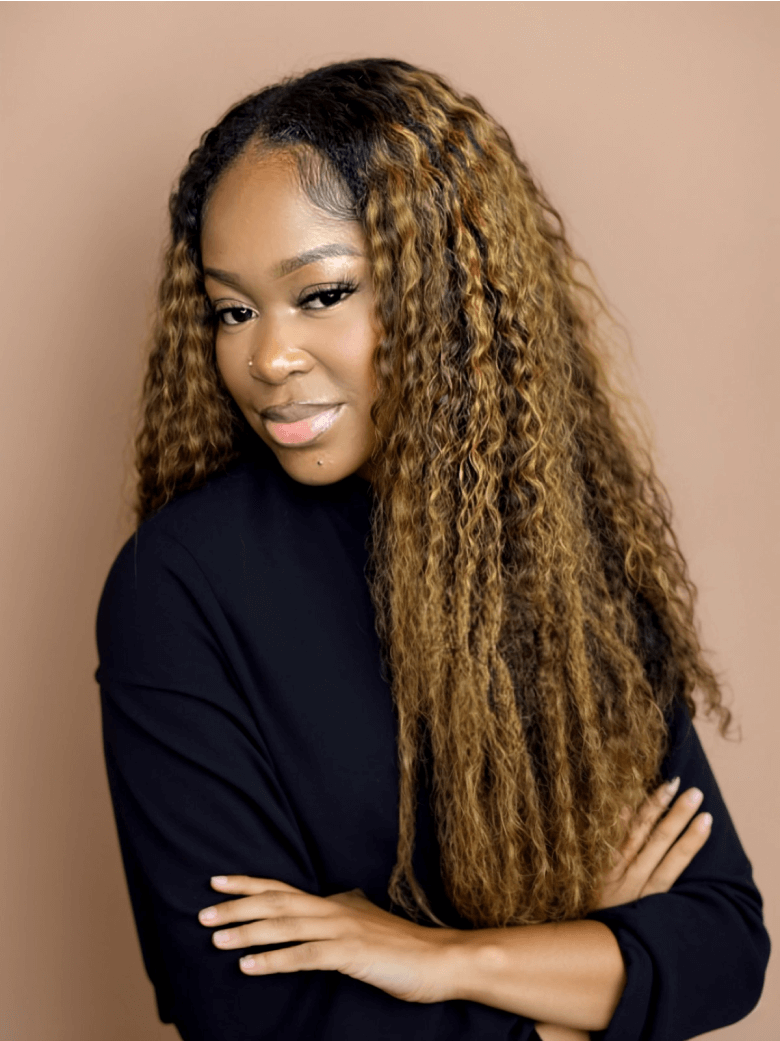 A model displays the UNice #FB30 Brown Balayage Highlight 4Pcs Jerry Curly Human Hair Bundles, showing a model with long curly hair standing in front of a wall and jerry.