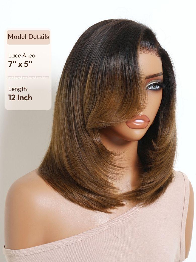 A model displays the UNice Bye Bye Slip 7x5 Lace Warm Brown with Beige Blonde Ribbon Highlights Layered wig, showing a model with blonde hair and a black top.