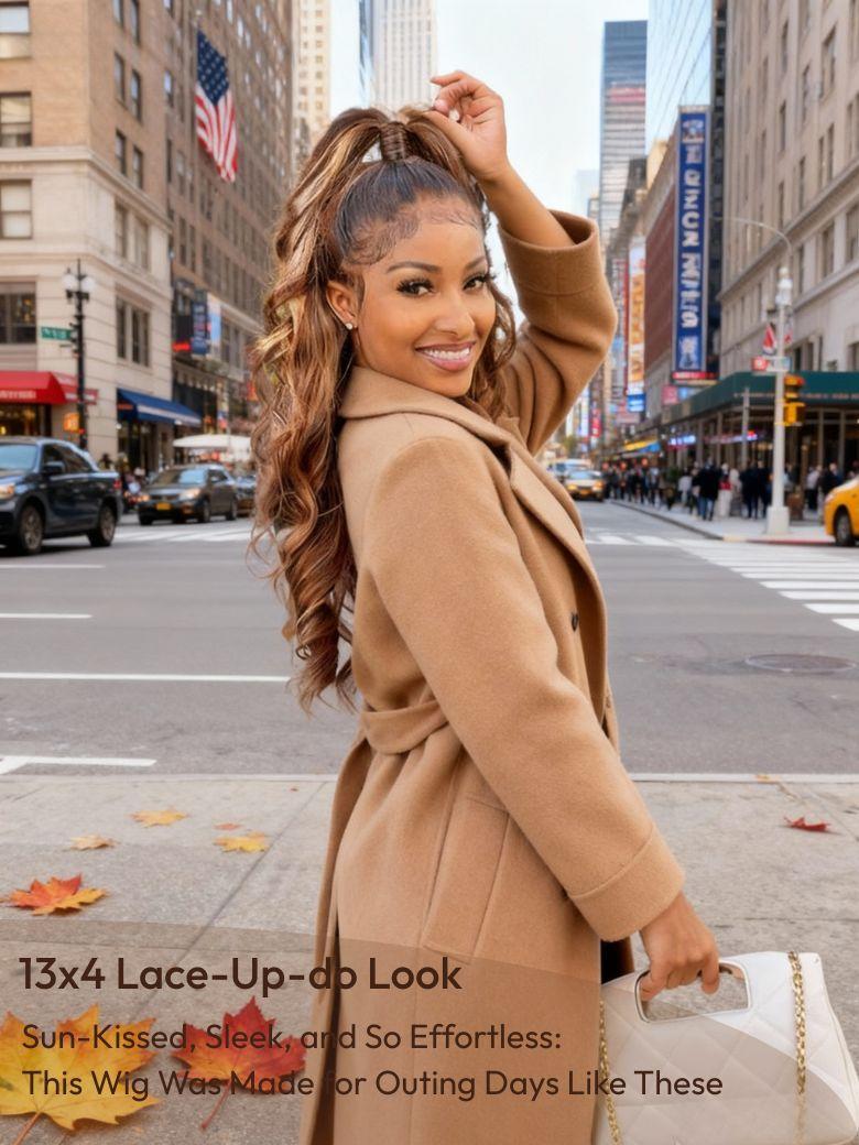 A model displays the UNice 7x5 Glueless Lace Bye Bye Knots Wig Pre-Cut Honey Blonde Body Wave Wig, showing a woman in a camel coat and black pants, with a white bag.