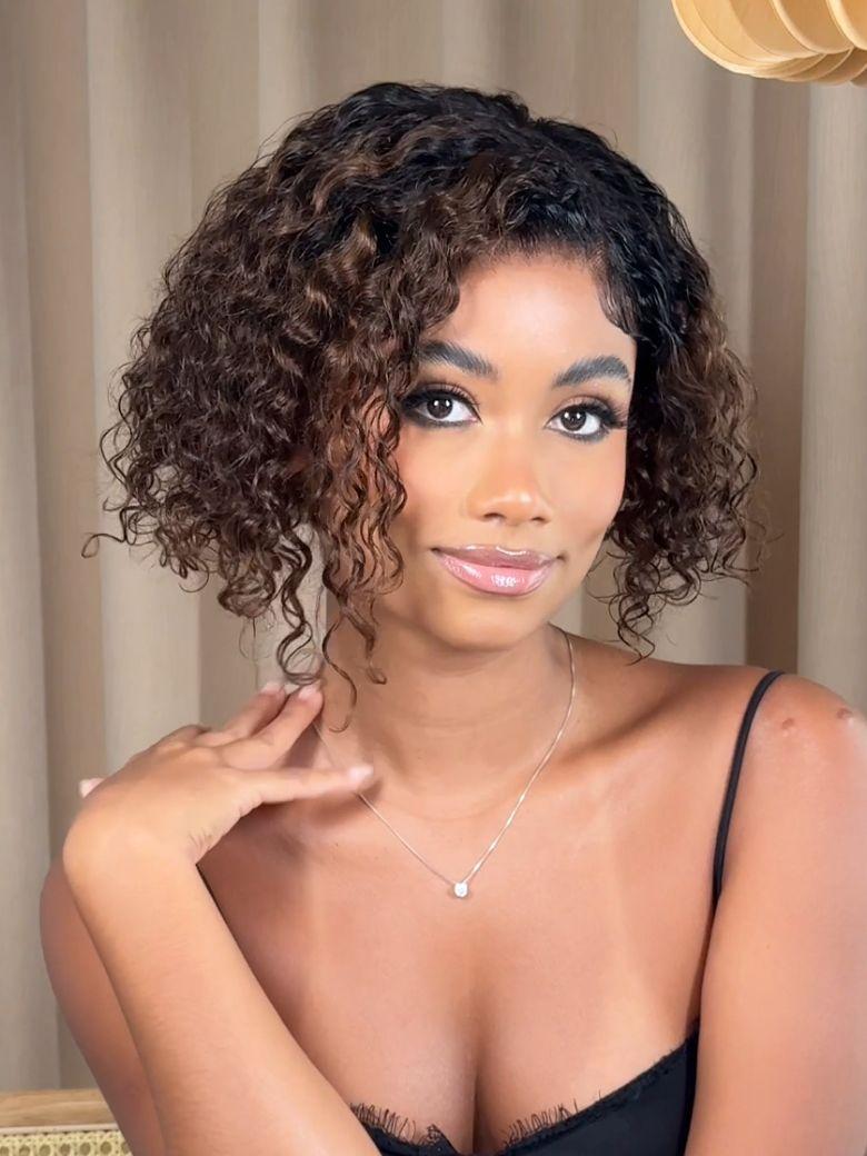 A model displays the UNice 7x5 Lace Bye Bye Slip Lace Frontal Side Part Wig Chestnut Brown Ombre Short, showing a model with curly hair and a black bra bra bra bra bra.