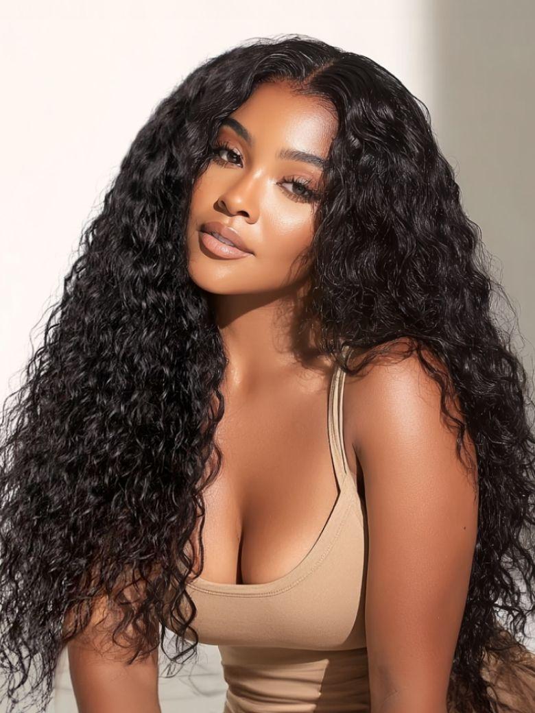 A model displays the UNice Invisi Drawstring " 13x4 Pre-Everything Natural Black Micro Water Wave Wig, showing a model with long curly hair and a tan top and water wave.