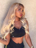 A model displays the UNice Hair 613 Blonde Body Wave Hair 13x4 Lace Frontal, showing a woman in a black top and neon green shorts and body wave texture, 613 blonde, 13x4.