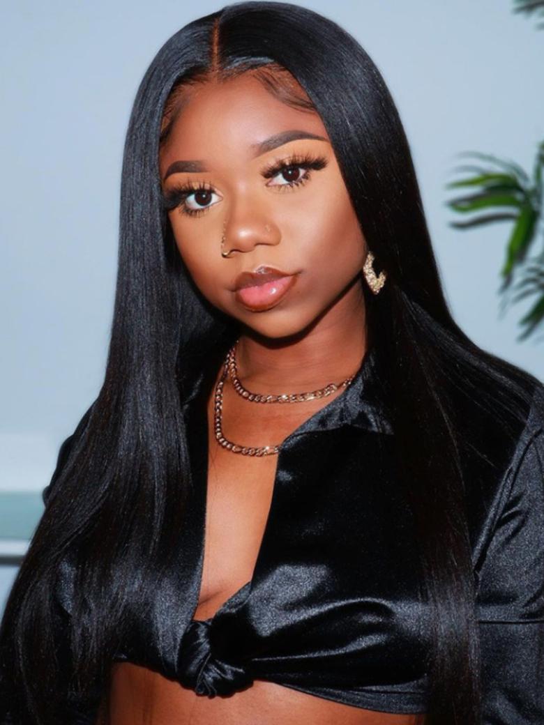 A model displays the UNice Yaki Hair Bundles 4 Pcs/pack Yaki Virgin Human Hair, showing a model with long black hair wearing a black top and yaki texture.