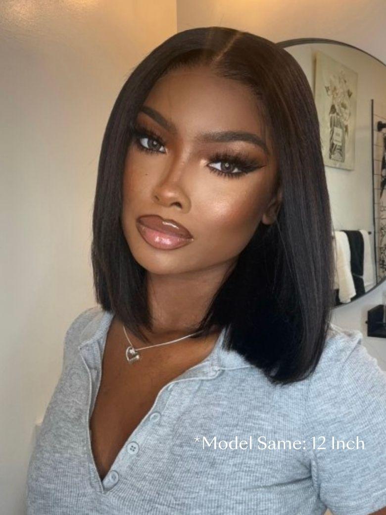 @NauteyaWhyee wearing a sleek UNice yaki straight black human hair bob wig with a precise middle part and natural scalp look.