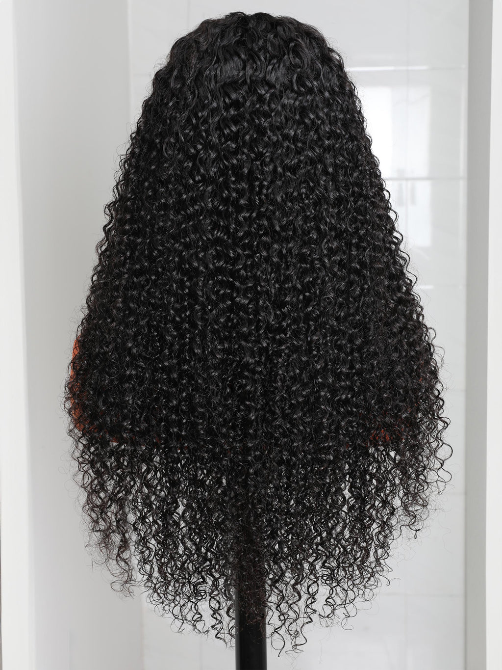 The UNice 280% Density 13x4 HD Lace wig Curly Lace Front wig Human Hair UNice visual image position 10 shows a wig with curly hair on a mann | curly texture, 13x4.