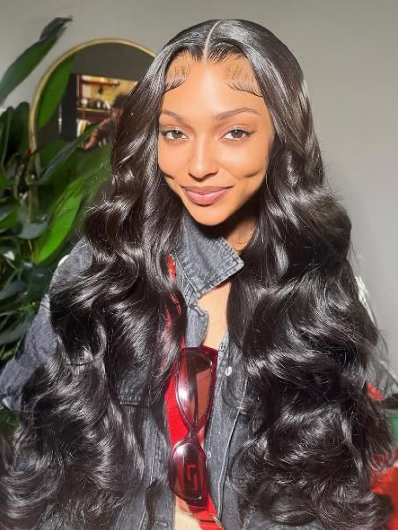 A model displays the UNice 22" and 24" are the same price Body Wave Full Lace Transparent Lace Human Hair, showing a model with long black hair wearing a denim jacket.