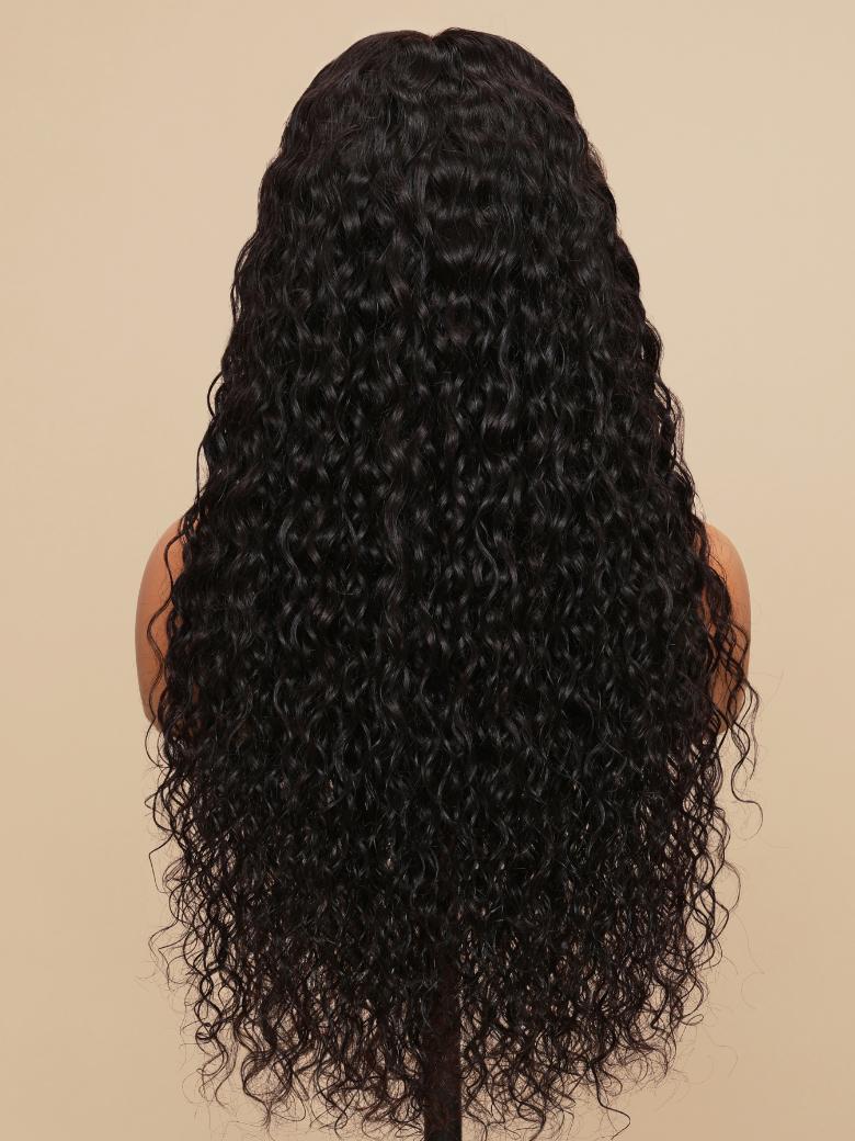 A model displays the UNice Facebook Special Offer Bye Bye Knots<span>TM</span> Wig 7x5 Quick Glueless Wet, showing a model with long black hair and water wave texture.