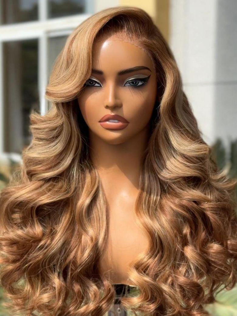 A model displays the UNice 13x4 Pre-Everything Lace Frontal Honey Blonde Highlights Fluffy Loose Wave, showing a wig with long wavy hair and a brown wig and loose wave.