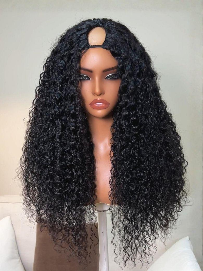 A model displays the UNice InvisiBlend V Part Curly Texture Drawstring Human Hair Wig With Finger Coil Ends, showing a model with long curly hair and brown shirt.