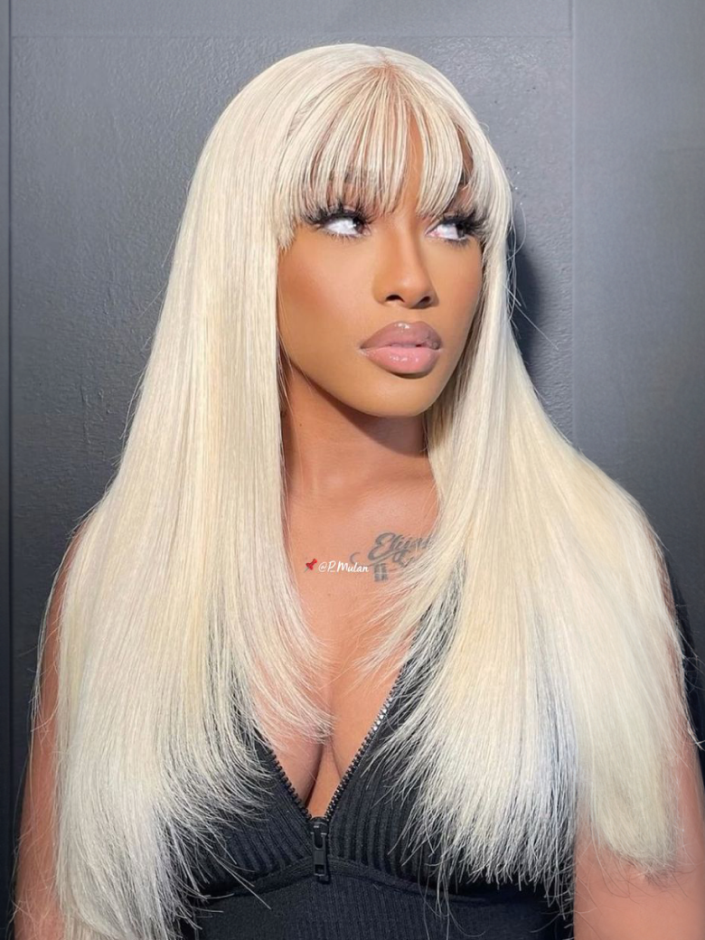A model displays the UNice 180% High Density 13x4 Lace Front Straight Hair Wig Layered Butterfly Haircut, showing a model with long blonde hair wearing a black top.