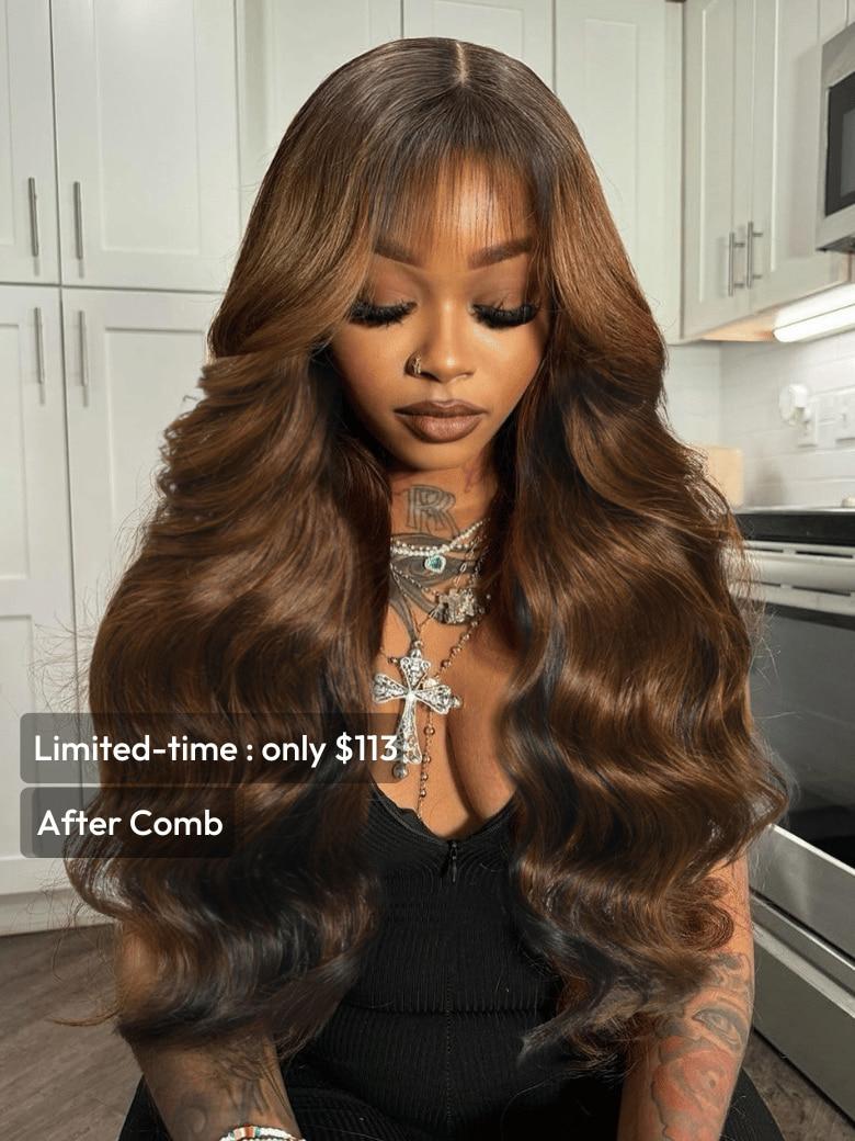 A model displays the UNice 7x5 Black Brown Money Piece Fluffy Loose Wave Curtain Bangs Wig, showing a model with long brown hair sitting on a kitchen counter and loose.