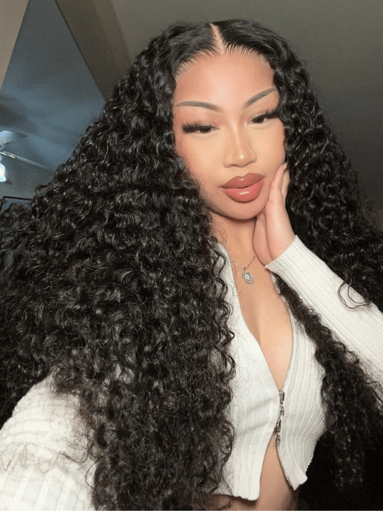 A model displays the UNice Pre-Everything 13x4 Lace Frontal Black Deep Wave Wig, showing a model with long curly hair and a white sweater and deep wave texture, 13x4.