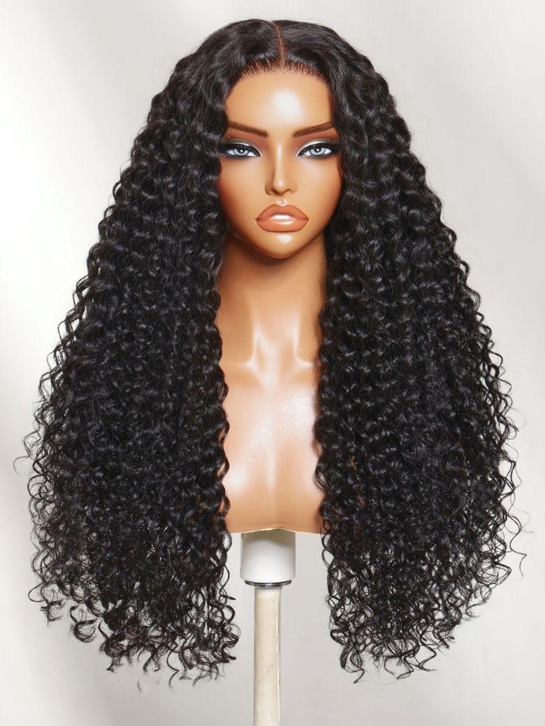 A model displays the UNice 13x4 Bye Bye Slip Lace Frontal Glueless Black Voluminous Deep Curly Wig With, showing a wig with long curly hair on a mann and curly texture.