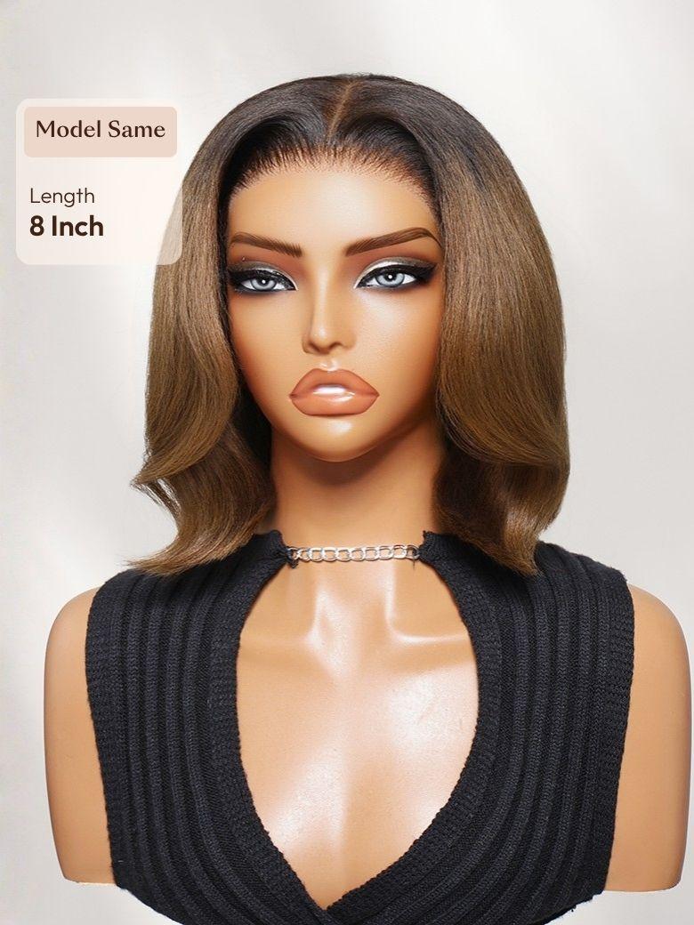 A model displays the UNice Bye Bye Slip 7x5 Lace Warm Brown with Beige Blonde Ribbon Highlights Layered wig, showing a model with blonde hair and a black top.