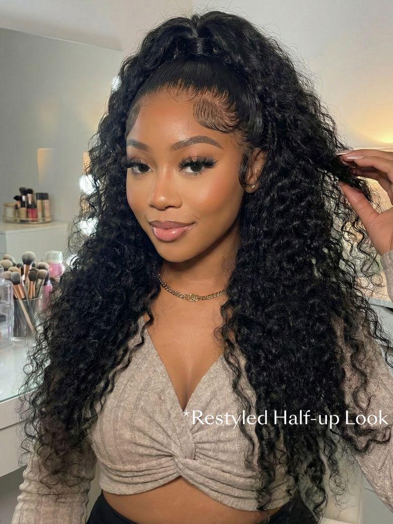A model displays the UNice Bye Bye Knots 7x5 Lace Jerry Curl 150% Density Wig with Lived-In Coils, showing a model with long curly hair in a salon and jerry curl.