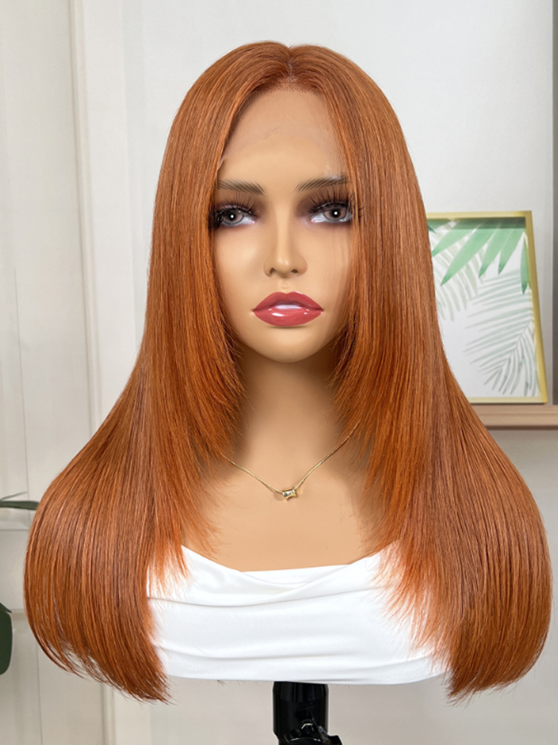 The UNice 26" Burnt Orange 13x4 Lace Front Wig 200% Density With Butterfly Wolf Layered Cut product image shows a wig with long red hair and bangs and 13x4, lace finish.