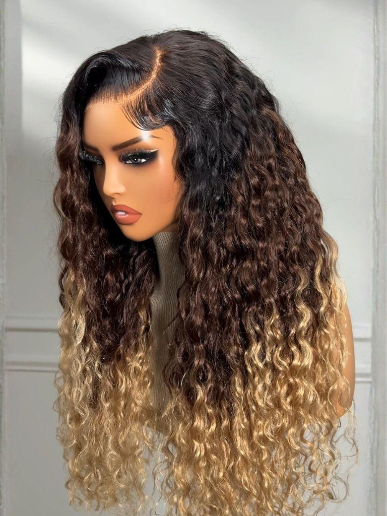 The UNice Bye Bye Knots 7x5 Lace Black to Brown to Blonde Ombre Water Wave Wig with product image shows a wig with long curly hair and water wave texture, ombre, 7x5.