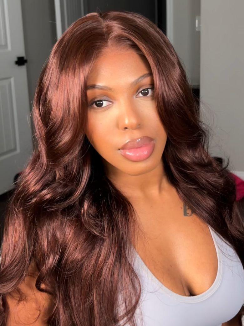 A model displays the UNice 24 Inch BOGO UNice Glueless Auburn Brown13x4 Pre-Everything Lace Frontal Loose, showing a model with long brown hair and a white top and loose.
