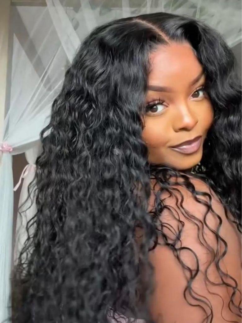 A model displays the UNice 7x5 Bye Bye Knots & 13x4 HD Lace Put On And Go Glueless Water Wave Wig and, showing a model with long curly hair wearing a black dress.