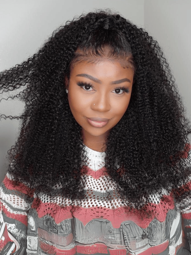 A model displays the UNice 200% Density HD Glueless 5x5 Lace Natural Afro Kinky Curly Human Hair Wig, showing a model with long curly hair wearing a red and white top.