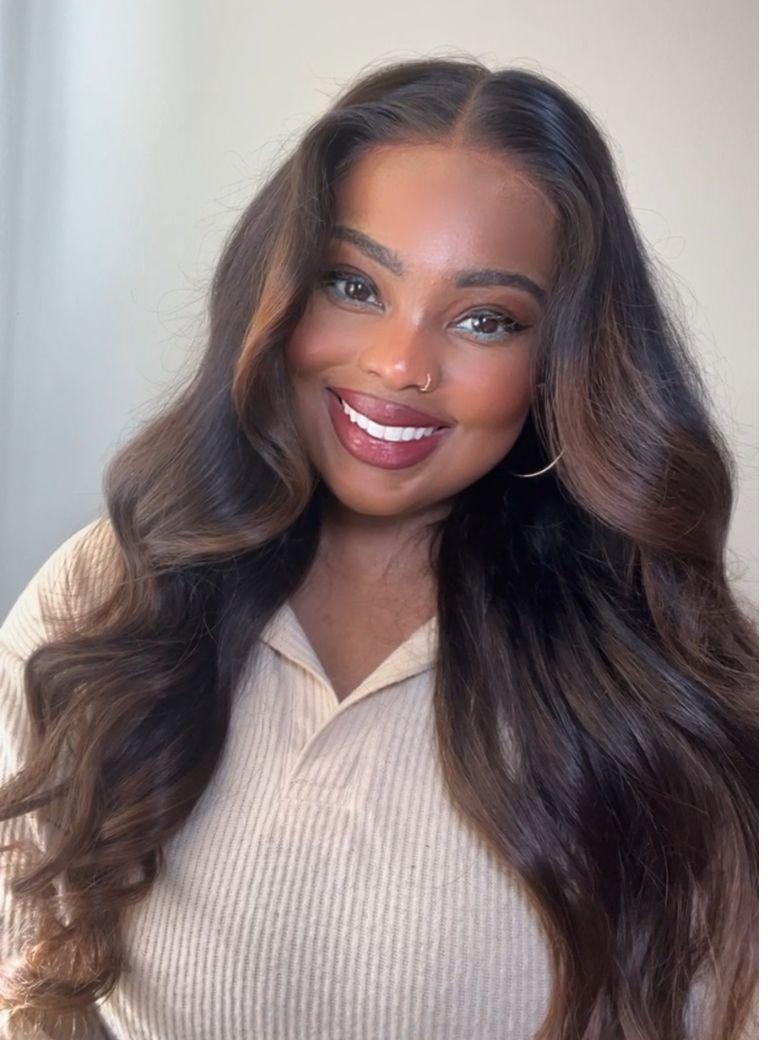 A model displays the UNice Chestnut Brown Ombre Body Wave 1 Piece Human Hair Bundle, showing a model with long hair wearing a tan colored sweater and body wave texture.