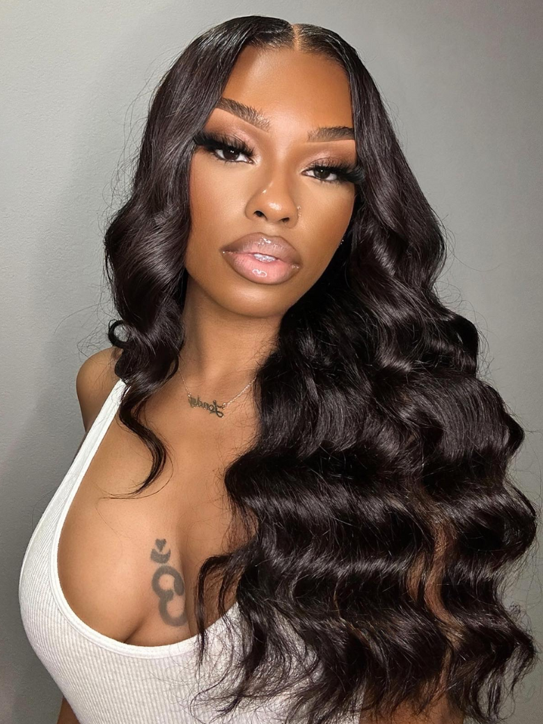 A model displays the UNice Hair Unprocessed 4 Bundles Body Wave Virgin Hair With 13x4 Lace Frontal, showing a model with long dark hair wearing a white top and body wave.
