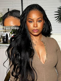 The UNice EasiContour V Part Glueless Yaki Wig 150% Density visual image position 3 shows a model with long hair and a brown sweater | visible text: Real Scalp | yaki.
