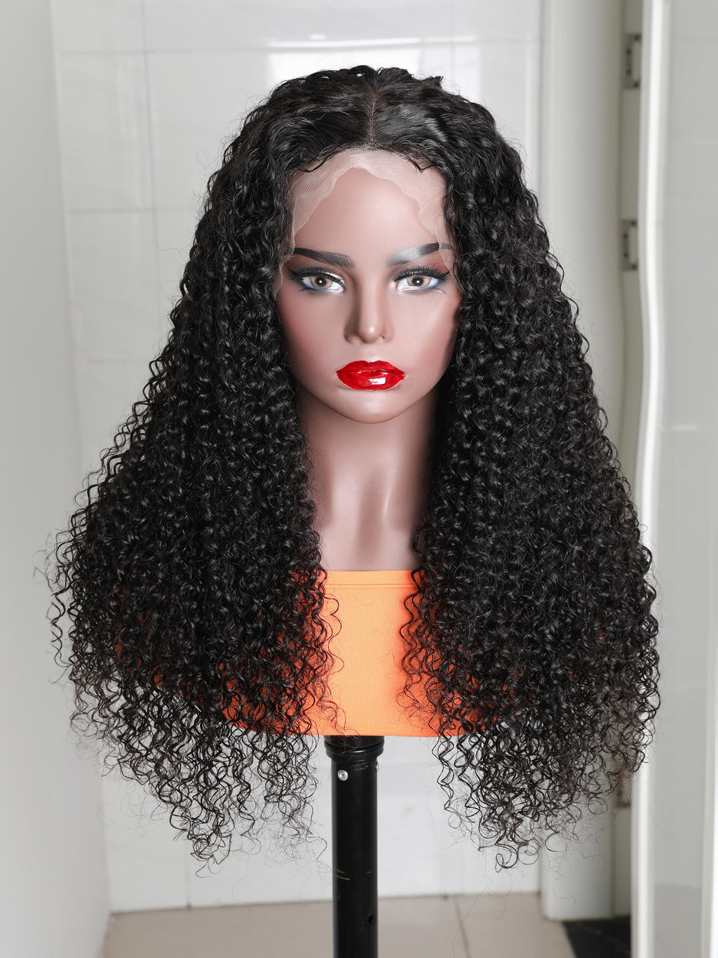The UNice 280% Density 13x4 HD Lace wig Curly Lace Front wig Human Hair UNice product image shows a wig with curly hair on a mann and curly texture, 13x4, glueless wear.