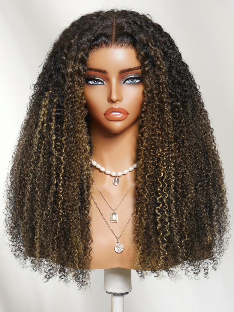 A model displays the UNice 7x5 Bye Bye Slip Lace Black with Blonde and Caramel Highlights Full Curly Wig, showing a wig with long curly hair on a mann and curly texture.