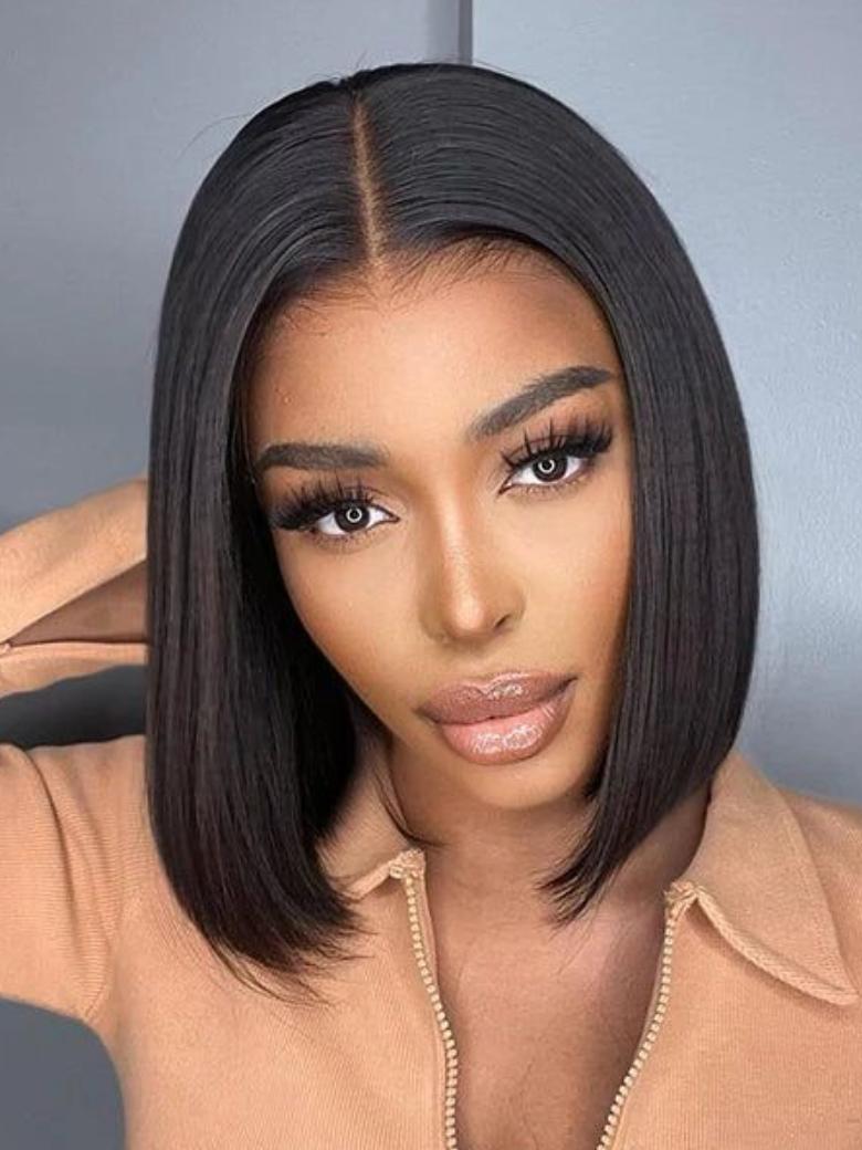 A model displays the UNice 13x4 Pre-Everything Lace Frontal Natural Black Bob Wig Pre Cut Lace Wig, showing a model with long black hair wearing a brown sweater.