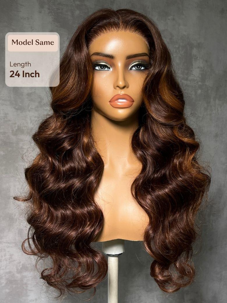 A model displays the UNice 7x5 Bye Bye Slip Lace Auburn Brown with Copper Highlights Body Wave Drawstring Wig, showing a wig with long wavy hair and brown.