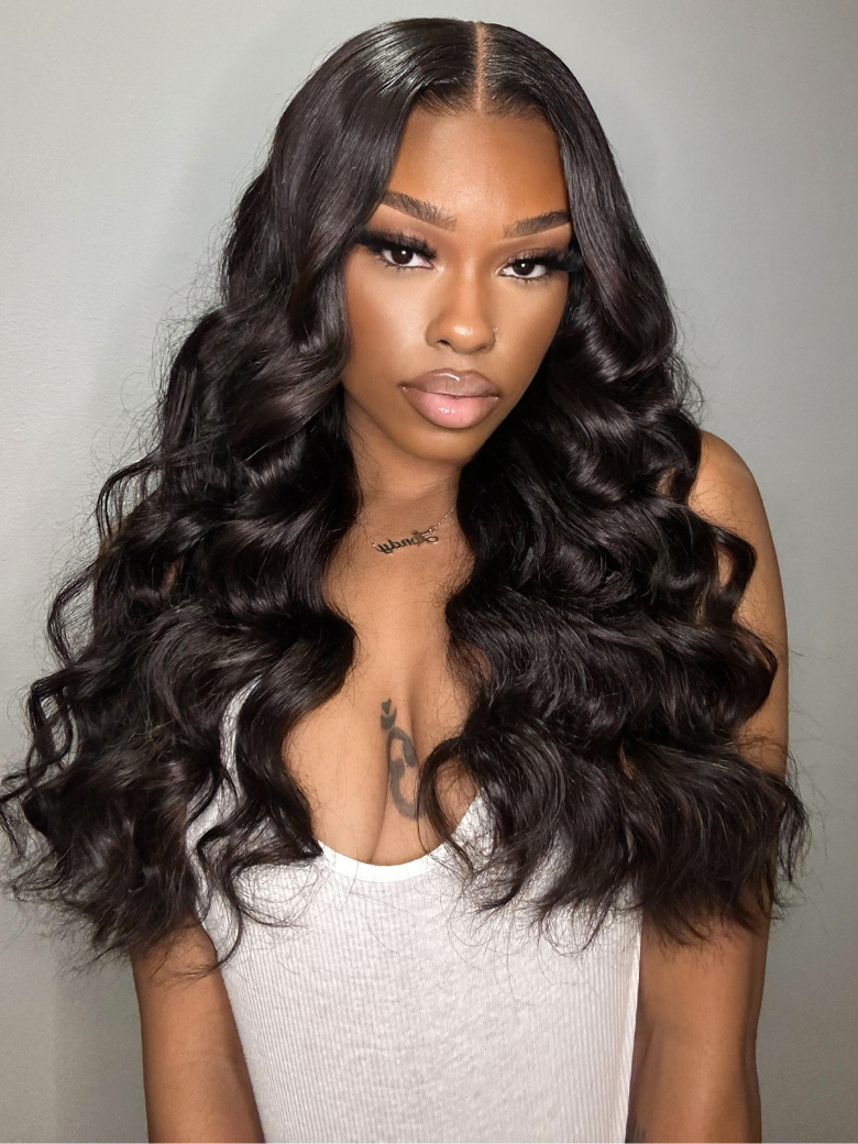 A model displays the UNice Hair Unprocessed 4 Bundles Body Wave Virgin Hair With 13x4 Lace Frontal, showing a model with long black hair wearing a white tank top.