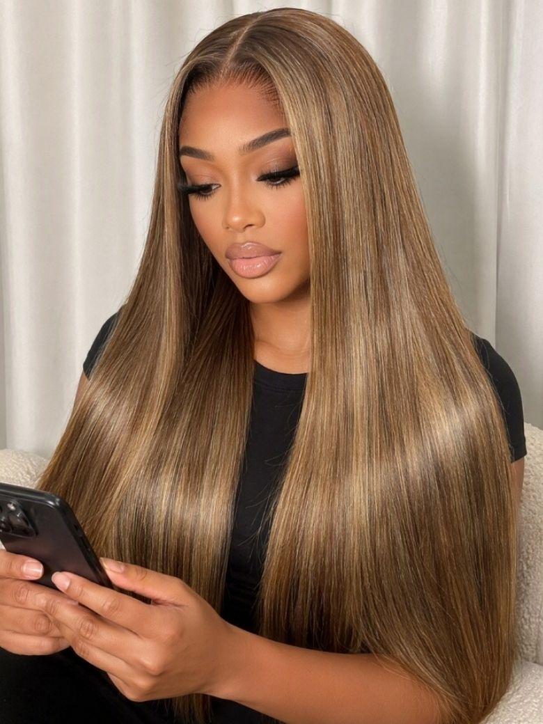 A model displays the UNice 13x4 Bye Bye Slip Lace Frontal Soft Ombre Caramel Brown Balayage Body Wave Wig, showing a woman sitting in a car with a cell and body wave.
