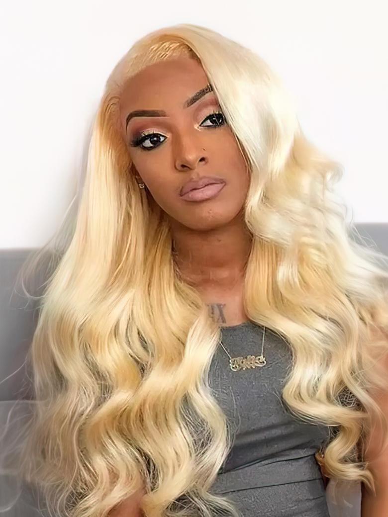 A model displays the UNice Hair 613 Blonde Body Wave Hair 13x4 Lace Frontal, showing a model with long blonde hair and a grey dress and body wave texture, 613 blonde.