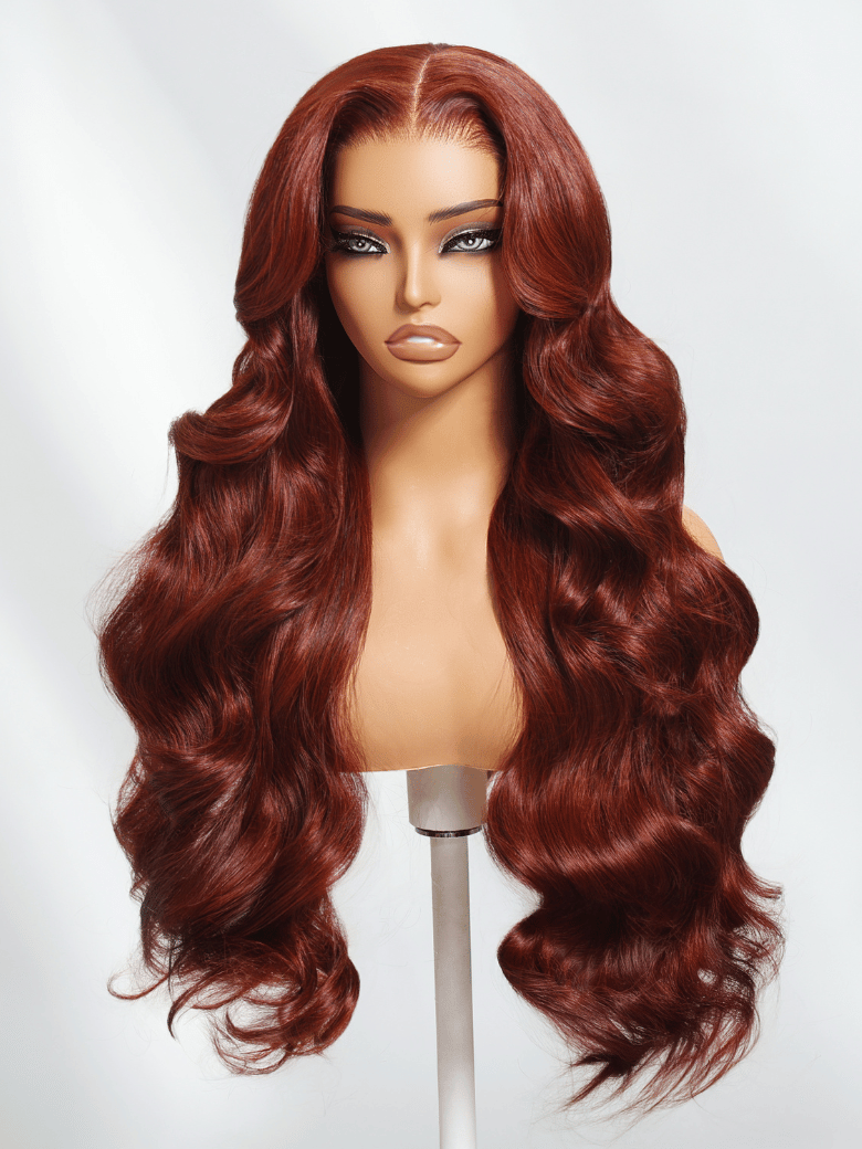 The UNice 7x5 Bye Bye Knots Wig Glueless Lace 150% Density Flattering Warm Tones Cherry product image shows a wig with long red hair and body wave texture, 7x5, glueless.
