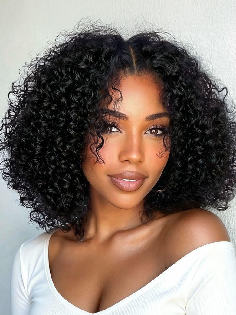 A model displays the UNice Invisi Drawstring 22" Bye Bye Knots 7x5 Lace Black Fluffy Kinky Coils Texture Wig, showing a model with curly hair and a white top and defined.