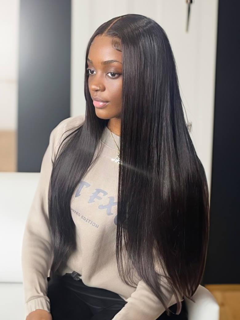 The UNice Hair Icenu Series 1 Piece Straight Human Virgin Hair visual image position 2 shows a woman sitting on a couch with long hair | straight texture.