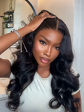 A model displays the UNice 20"-24" UNice 13x4 Pre-Everything HD Lace & Transparent Lace Front 3D Body wig, showing a model with long hair in a white shirt and body wave.