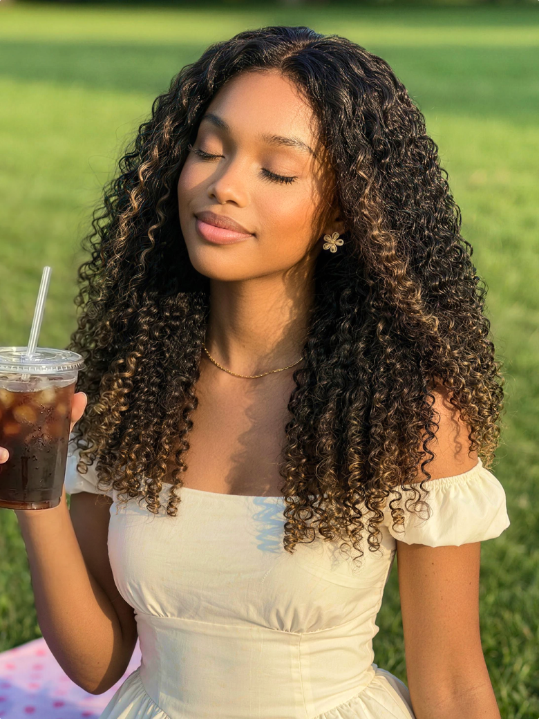 A model displays the UNice 7x5 Bye Bye Slip Glueless Lace Black to Chestnut Brown Ombre Burmese Curly wig, showing a model with curly hair and Burmese curly texture.