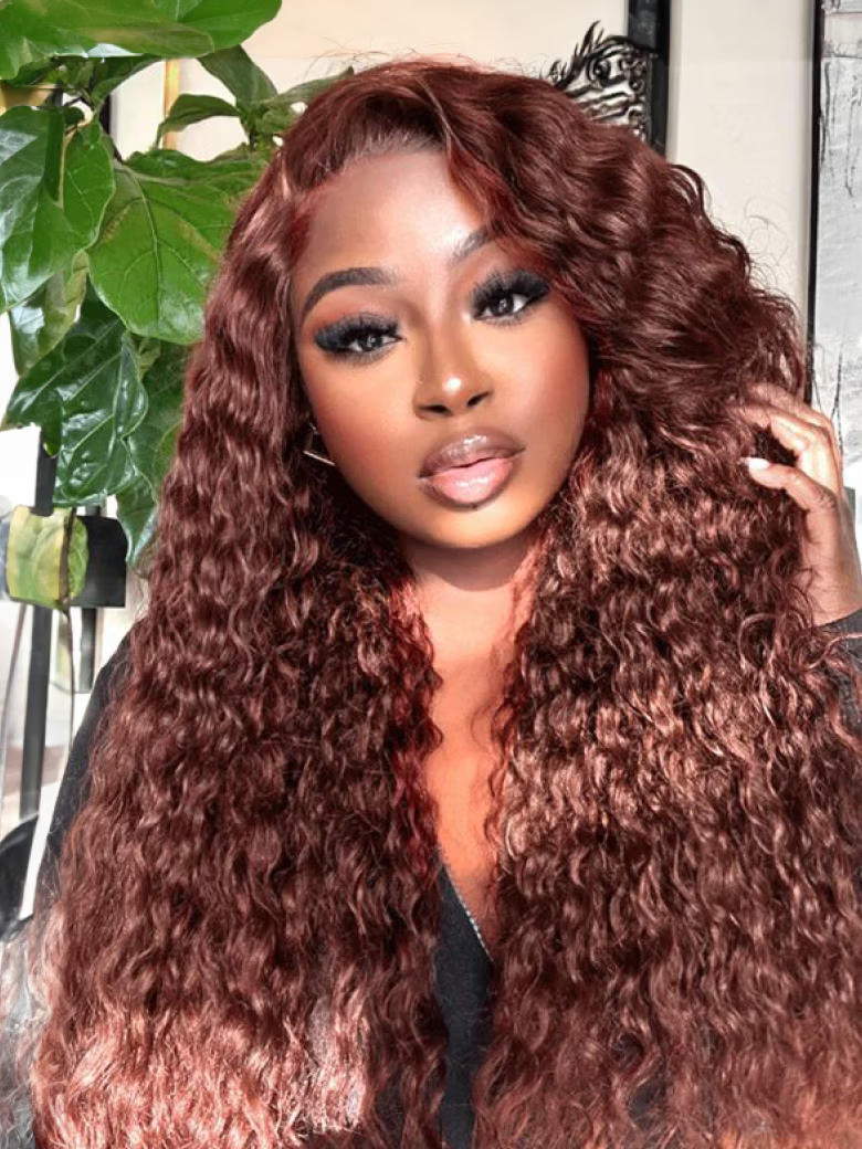 A model displays the UNice 180% Density Reddish Brown Water Wave Or Honey Blonde Jerry Curly 13x4 wig, showing a model with long curly hair wearing a black top and water.
