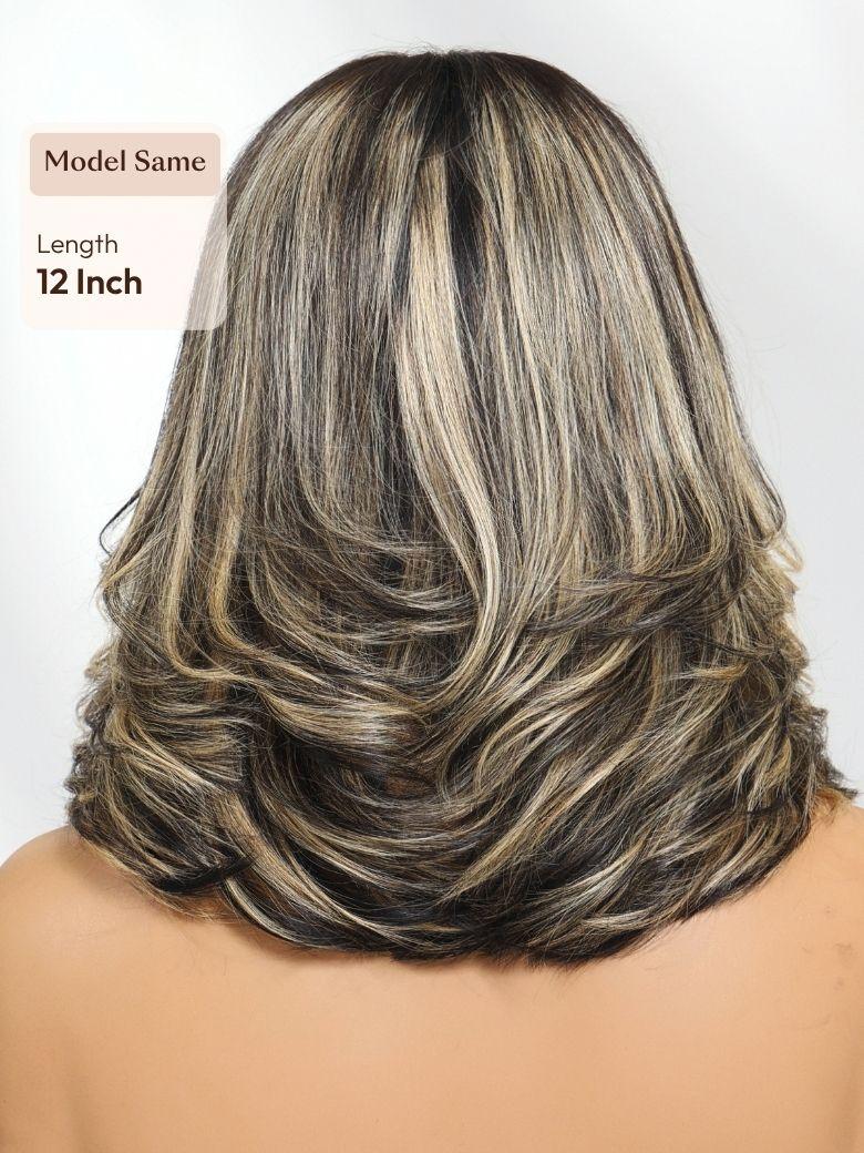 A model displays the UNice 7x5 Bye Bye Slip Lace Dark Brunette with Ash Blonde Highlight Layered Wavy Bob, showing a model with blonde hair and a long bob bob bob bob.