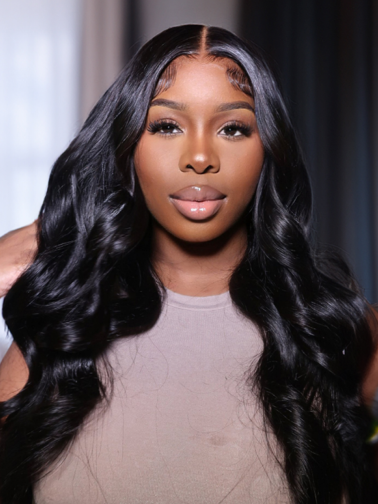 A model displays the UNice 7x5 Bye Bye Knots Body Wave Wig Pre Cut Lace Pre Plucked Hairline Put On and, showing a model with long black hair wearing a wig and body wave.