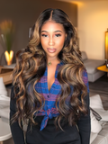 A model displays the UNice Balayage Highlight Human Hair Weave #FB30 Body Wave Hair Bundles 3 Bundle Deals, showing a model with long brown hair and a blue shirt.