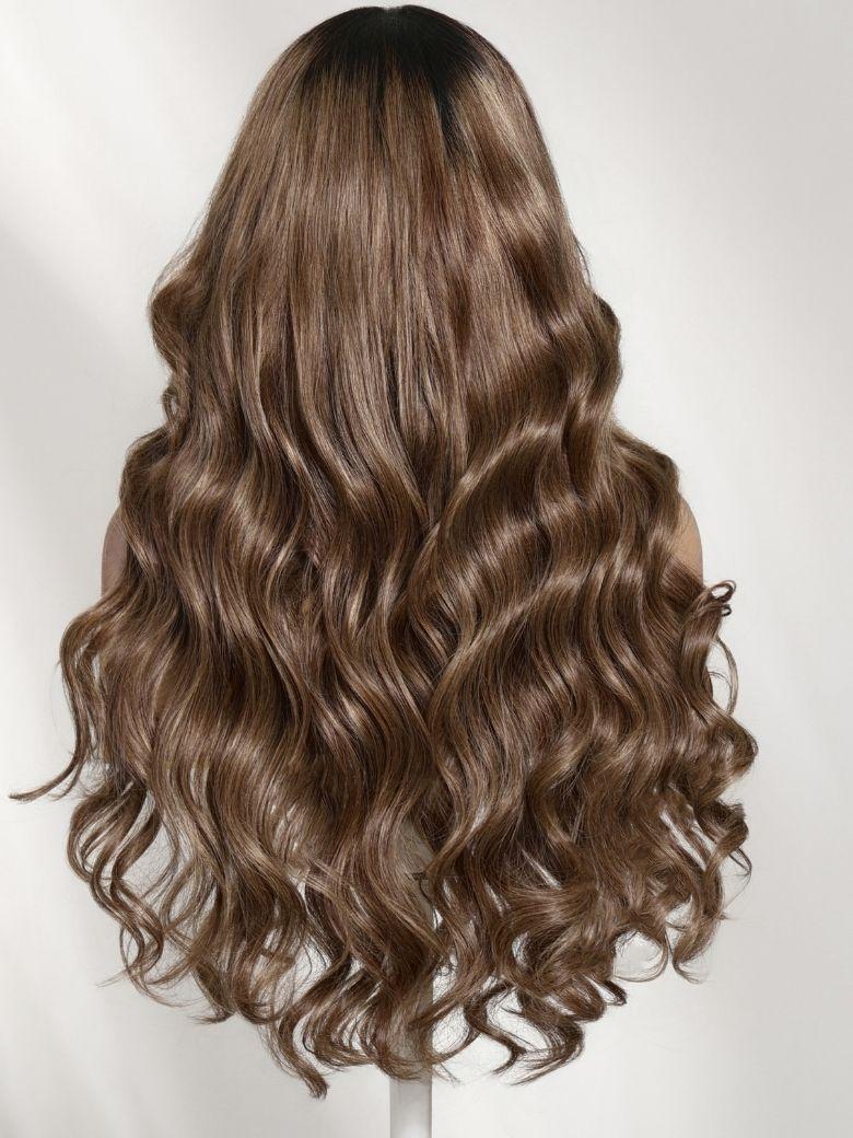 A model displays the UNice Bye Bye Slip 7x5 Lace Glueless Ash Brown Highlights Luxury Body Wave wig, showing a model with long brown hair and wavy brown hair and body.
