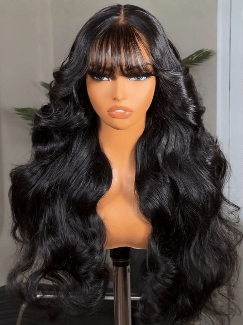The UNice 7x5 & 13x4 Bye Bye Slip Pull & Go Black Fluffy Loose Wave Wispy Bangs Glueless product image shows a wig with long hair and bangs and loose wave texture, 7x5.