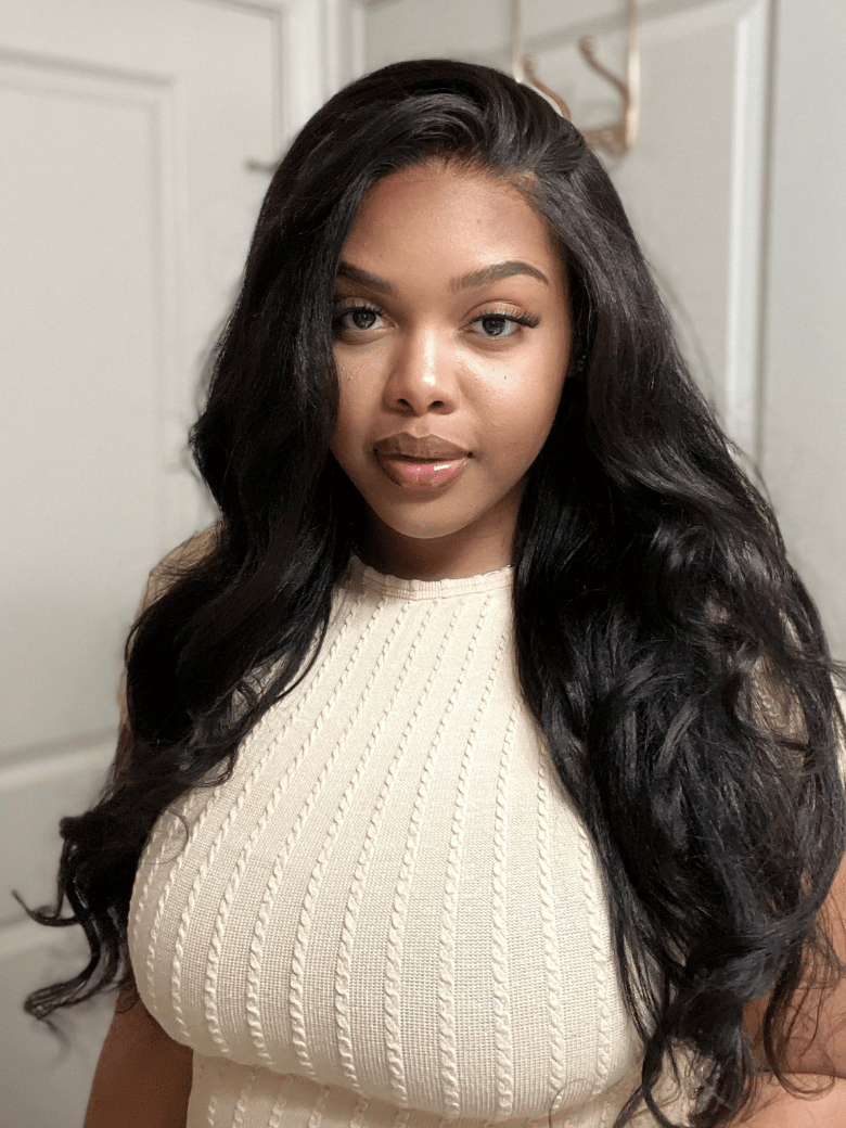 A model displays the UNice 7x5 Lace Bye Bye Knots & 13x6 Lace Frontal Black Body Wave Pre-Everything Wig, showing a model with long black hair and body wave texture.