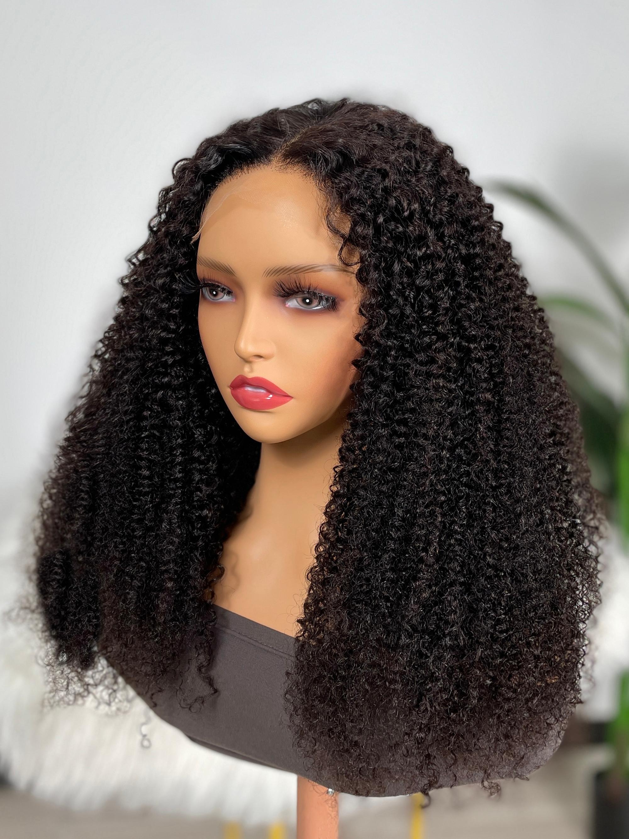 The UNice 200% Density HD Glueless 5x5 Lace Natural Afro Kinky Curly Human Hair Wig product image shows a doll with long curly hair and a black dress and kinky curly.