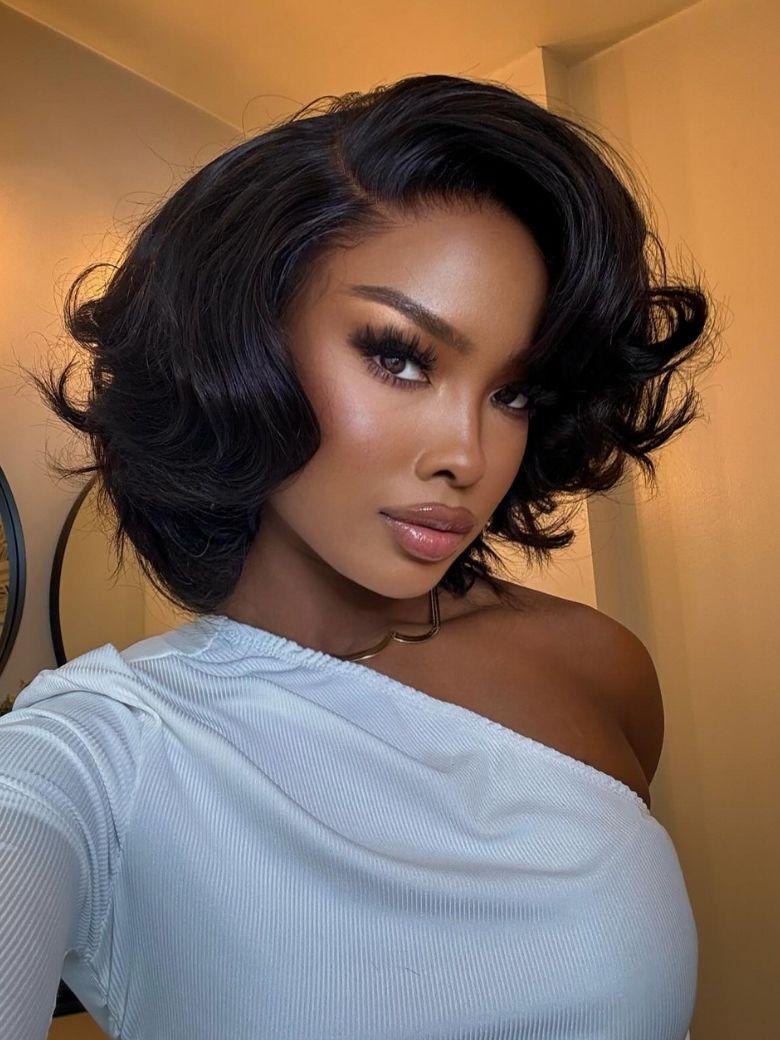 A model displays the UNice 13x4 Lace Front 200% Density Big Loose Wave Black Shoulder Length Wig, showing a model with short hair wearing a white top and loose wave.