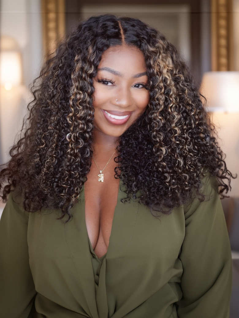 A model displays the UNice 6x4.5 Pre Cut Lace Curly Wig Put On And Go Quick Easy Black With Blonde Highlights, showing a model with long curly hair and a green shirt.