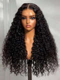 The UNice Bye Bye Knots 7x5 Lace Mixed Curls Wig with Invisi Drawstring product image shows a wig with long curly hair on a mann mann and 7x5, lace finish, drawstring.